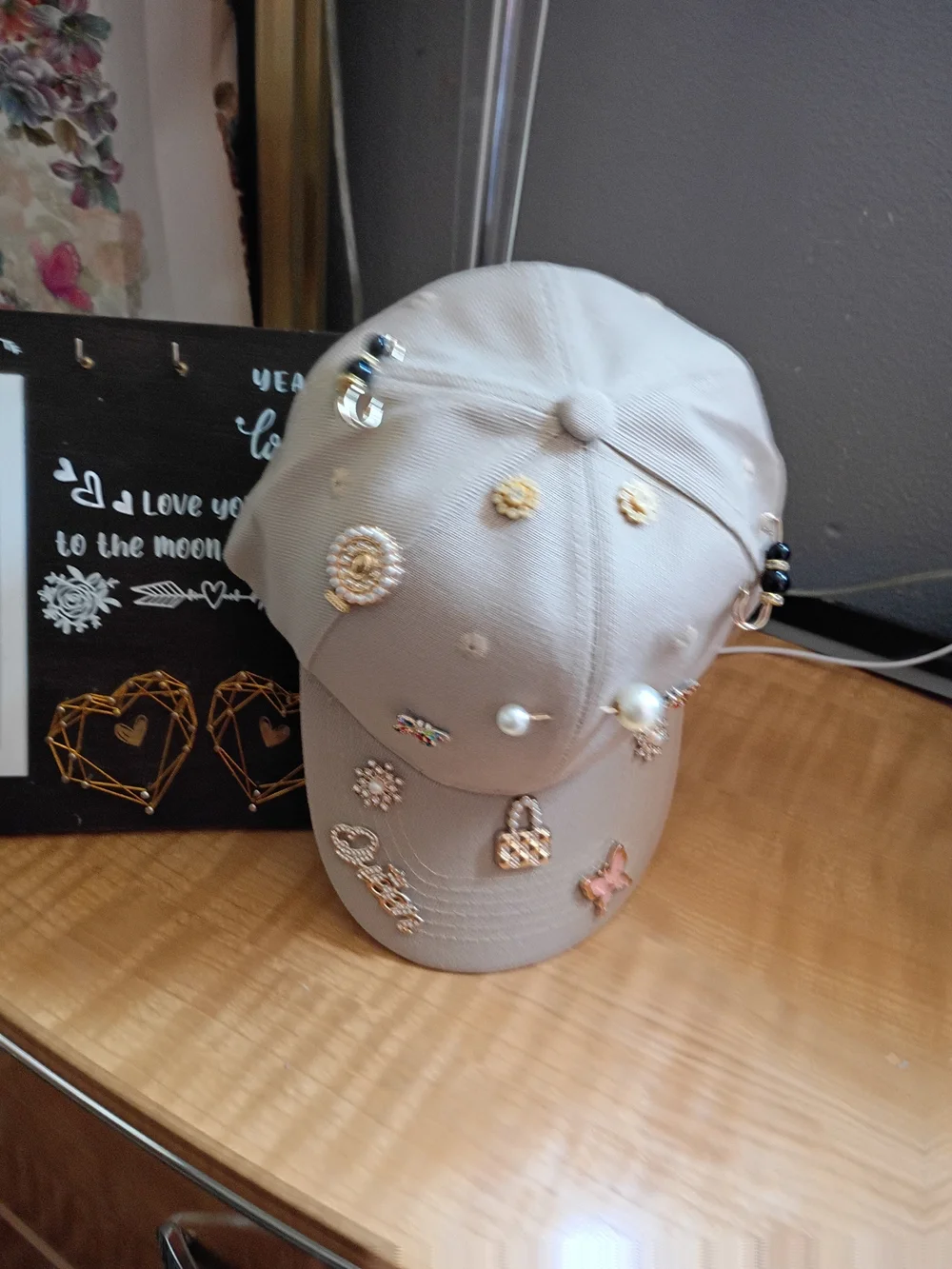 Embellished Beige Baseball Cap with Pearl & Charm Accents